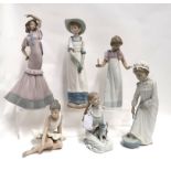Six Nao figures including ballerina, girl and puppy etc Condition Report: girl holding a candle is