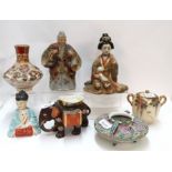 A collection of atsuma pieces incluing an elephant match holder, figures, a lidded pot etc Condition