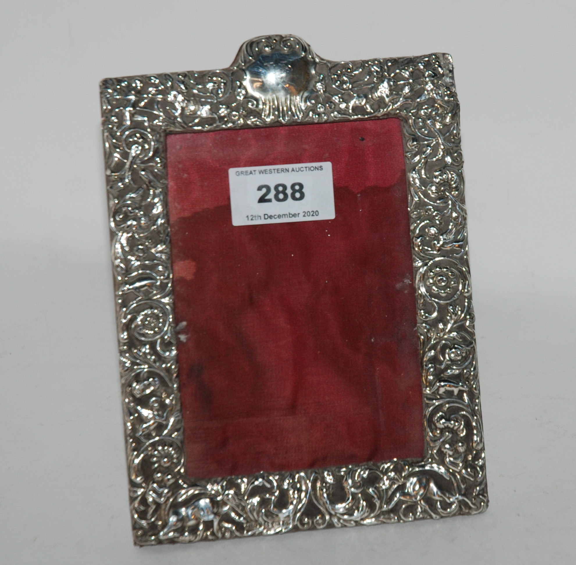 A silver mounted photo frame, Birmingham 1927, 18cm x 11cm, aperture 13cm x 19cm Condition Report: