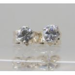 A pair of 9ct white gold diamond stud earrings set with estimated approx 0.40cts of brilliant cut