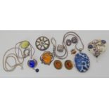 Silver mounted amber items, a ceramic shard pendant, chain and other items Condition Report: Not