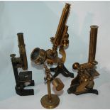 Three various brass microscopes including J. Lizars example etc Condition Report: Available upon