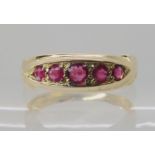 A 9ct gold ruby five stone ring, hallmarked Sheffield 1919, finger size M1/2, weight 3gms