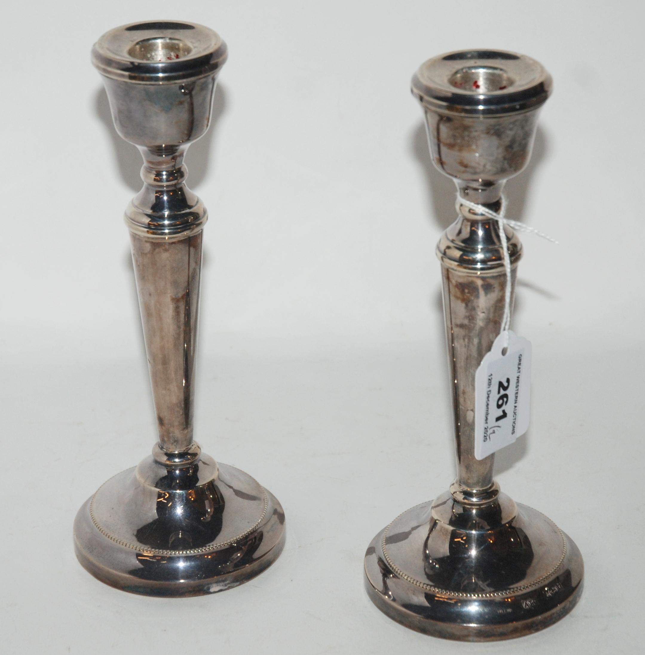 A pair of silver candlesticks, Birmingham 1996, 21cm high (weighted) Condition Report: Available