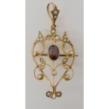 A 9ct gold garnet and pearl set Edwardian pendant brooch dimensions 4.8cm x 2.2cm, weight 3.5gms