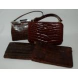 A collection of animal skin bags and purses Condition Report: Available upon request