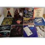A box of rock and heavy metal vinyl LP records with Black Sabbath, Sweet, Status Quo, The Boom