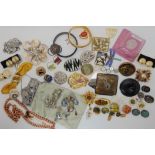 A pewter framed handbag by Richard Coley, gem set lizard brooch, jet brooch and other items