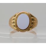 A 9ct agate set signet ring, size Q1/2, weight 6.2gms Condition Report: Available upon request