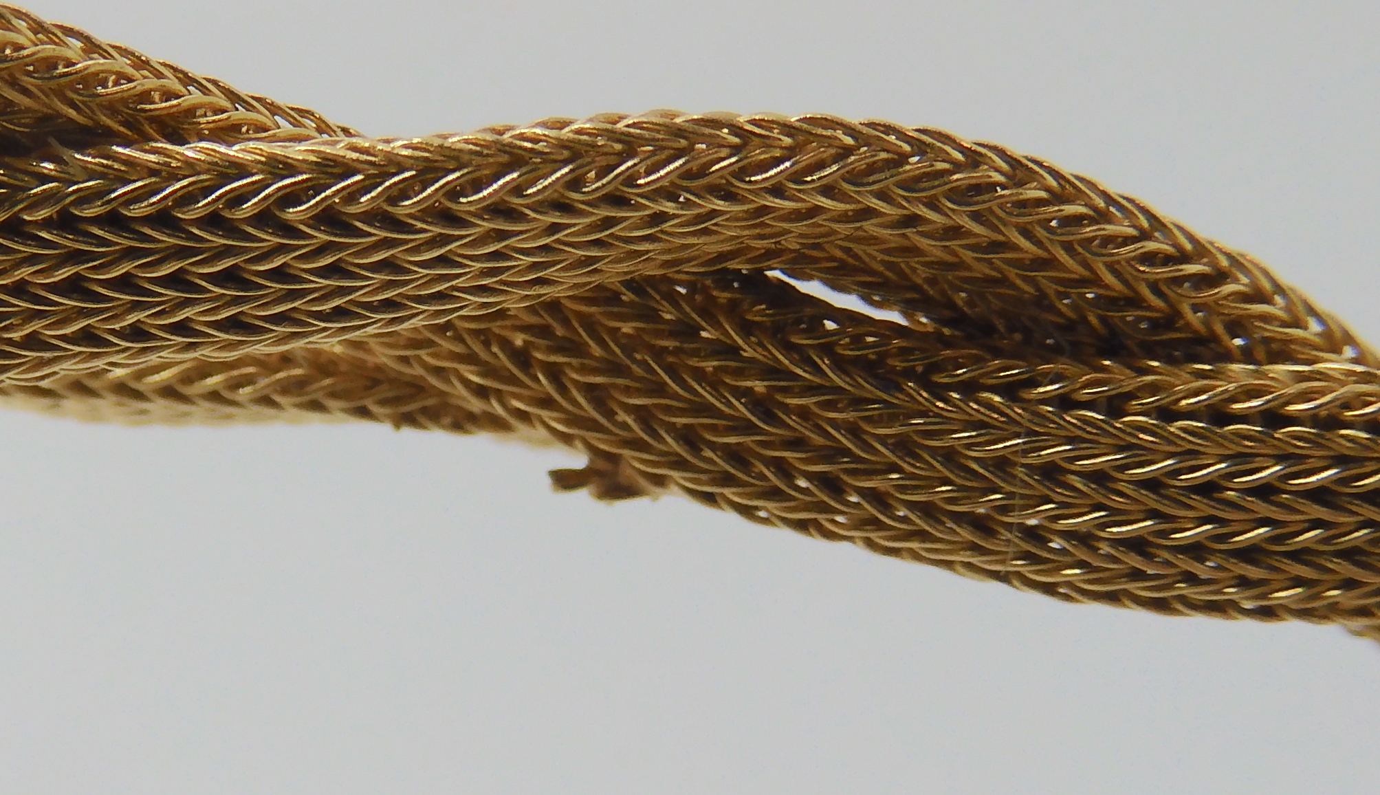 An 18ct gold knitted mesh style chain bracelet, length 19.5cm, weight 31.6gms Condition Report: This - Image 3 of 4