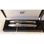 A stamped Mont Blanc silver-cased and gilt-metal pen set, the cases stamped Ag, 925, fountain pen