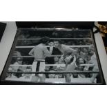A folder of autographed boxing photographs including Sugar Ray Leonard, Roberto Durran, Frank Bruno,