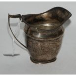 A silver cream jug, Sheffield 1923, 9cm high, 161gms Condition Report: Available upon request