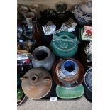 Three porcelain masks, a Jack Daniels stoneware flagon, together with assorted studio pottery