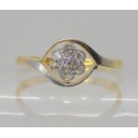 An 18ct gold diamond flower ring, set with estimated approx 0.20cts of old cut diamonds, size Q,