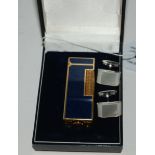 A cased Dunhill cigarette lighter and a pair of Dunhill cuff links Condition Report: Available