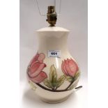 A Moorcroft Pink Magnolia pattern lamp, 31cm high Condition Report: Available upon request