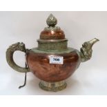 A Chinese white metal and copper dragon teapot 27cm high Condition Report: Available upon request