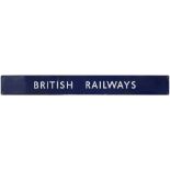 BR(E) enamel poster board heading BRITISH RAILWAYS measuring 51in x 5.75in. In good condition with a