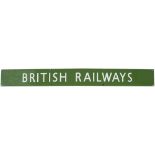 BR(S) enamel poster board heading BRITISH RAILWAYS measuring 53in x 5.75in. In very good condition