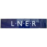 LNER enamel poster board heading measuring 28in x 5.75in. In very good condition with minor edge