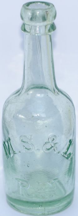 Manchester Sheffield and Lincoln Railway clear glass Beer Bottle. Embossed in the front MS&L RLY.