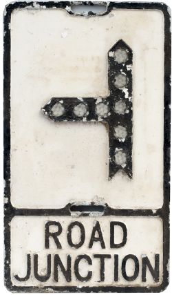 Road sign ROAD JUNCTION cast aluminium with glass reflectors. In original condition measures 21in