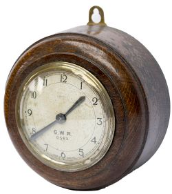GWR oak cased Pork Pie wall clock with an English Smiths movement and the dial marked GWR 0553.