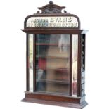 Advertising cigarette display cabinet ASK FOR EVANS SPECIAL CIGARETTES. An ornate wooden, glazed and