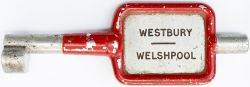 GWR/BR-W Tyers No9 single line aluminium key token WESTBURY - WELSHPOOL, configuration A. In ex