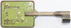 Evesham-Moreton in Marsh BR-W Tyers No9 single line bronze key token, configuration C, stamped