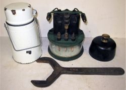 A Miscellaneous Lot which includes an early GWR Signal Box Relay. Drivers Enamel Billy Can. GWR