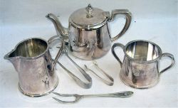 A Lot containing GWR silver plate tableware. GWR Tea pot. Milk jug and sugar bowl all engraved GWR