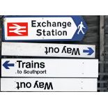 A Lot containing 4 x modern station direction signs. Exchange Station. 2 x Way Out with arrow.