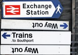 A Lot containing 4 x modern station direction signs. Exchange Station. 2 x Way Out with arrow.