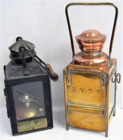 2 x French Railway handlamps. One copper with brass door embossed, S.N.C.F together with one