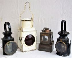 A lot containing 4 x railway lamps. BR Tail Lamp complete with reservoir on a chain. LNER 2 aspect