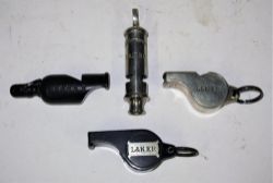 4 x L&NER Whistles. 2 x Acme Thunderer's marked L&NER. Police whistle stamped L&NER. Bone Guards