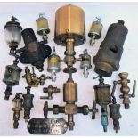 A Lot containing a large collection of steam lubricators, relief valves and anti-vacuum valve in