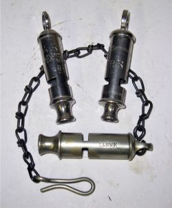 3 x Railway Police Whistles. LMS ARP. BR. L&NWR with chain all in good condition.