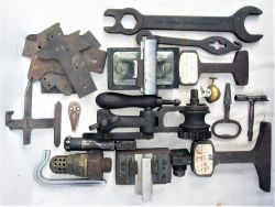 A Lot containing several miscellaneous railway parts mainly tools, carriage keys, GWR Gauge glass