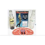 A miscellaneous lot containing 2 x oil bottles, SAE 30 and BATOYLE together with advertising