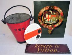 A miscellaneous Lot containing a GWR fire bucket. BRW ground disc plate. Great Western Railway Crest