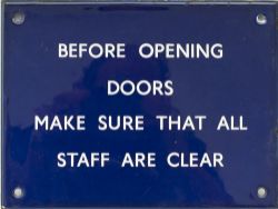 BR(E) enamel BEFORE OPENING DOORS MAKE SURE ALL STAFF ARE CLEAR, measures 8in x 6in and is in