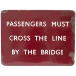 BR(M) FF enamel railway sign PASSENGERS MUST CROSS THE LINE BY THE BRIDGE. In good condition with