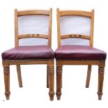 A pair of oak Great Eastern Railway chairs, nicely restored with GER carved into the back rails.