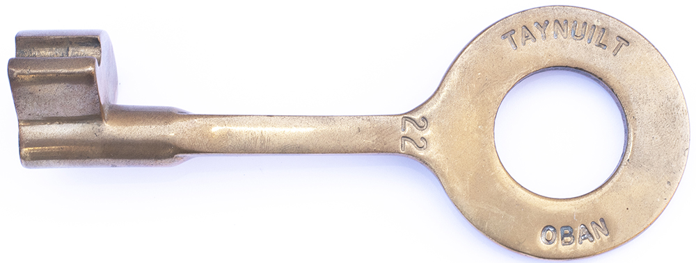 Tyers bronze single line key token TAYNUILT - OBAN from the former Caledonian line section. In