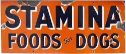 Advertising enamel sign STAMINA FOODS FOR DOGS measuring 25in x 10.5in. In good condition with