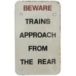 British Railways enamel sign BEWARE TRAINS APPROACH FROM THE REAR measuring 11in x 6in. In excellent
