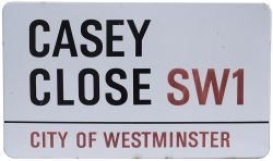 Road enamel sign CASEY CLOSE SW1 CITY OF WESTMINSTER. Fully flanged, measures 30in x 17.5in. In very